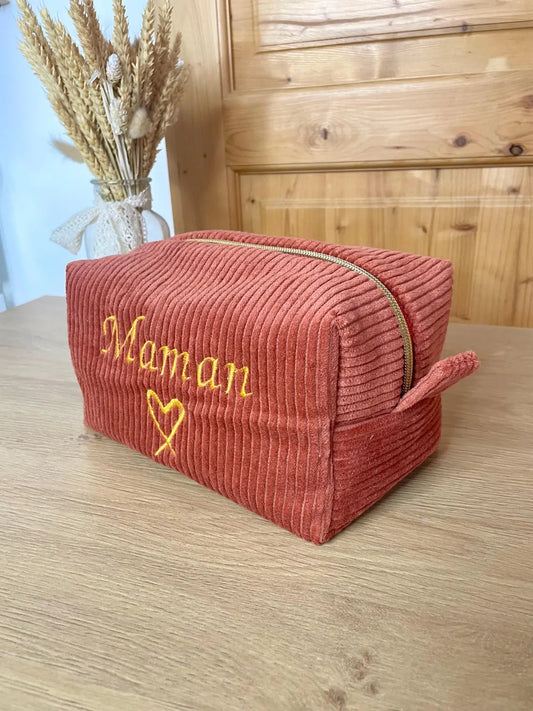 Trousse en velours brodée