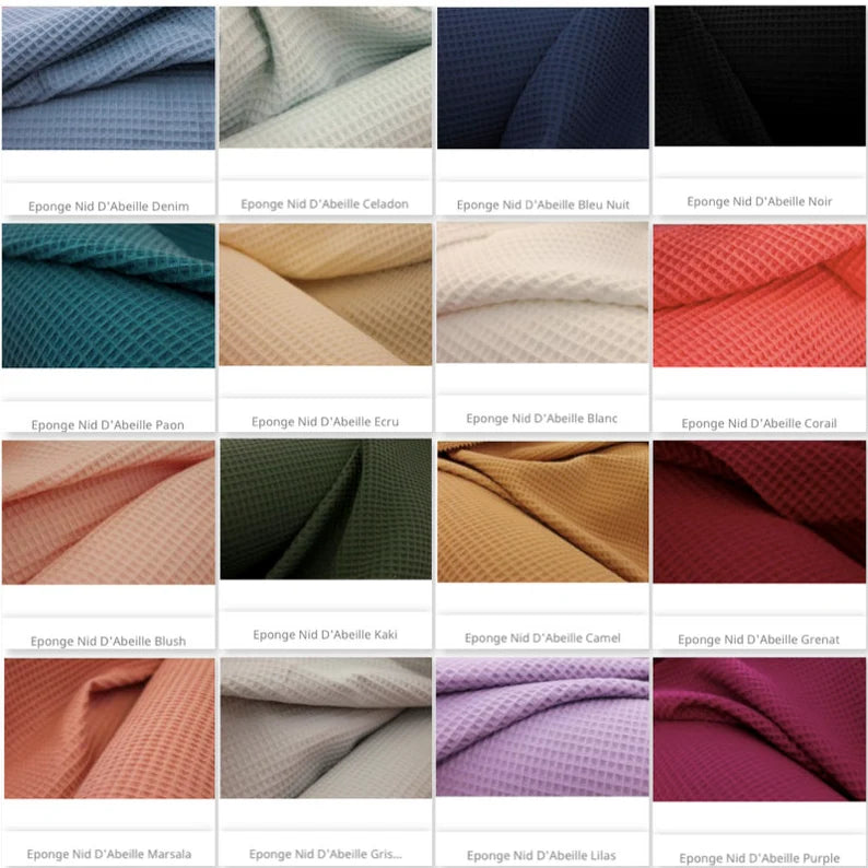 Tapis à langer nomade brodé