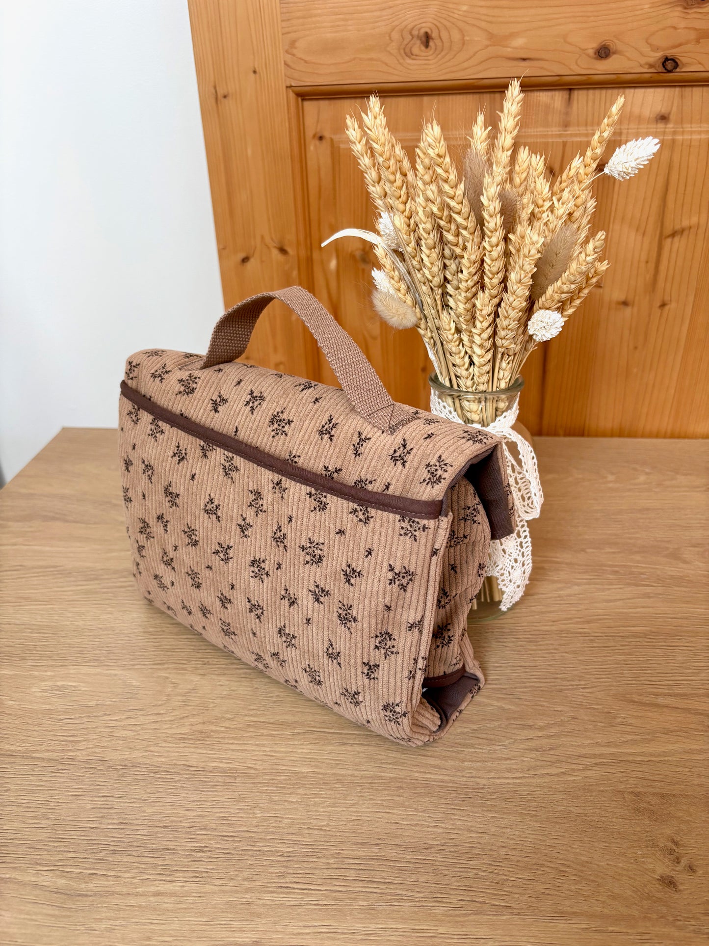Pochette à langer nomade – Velours fleuri