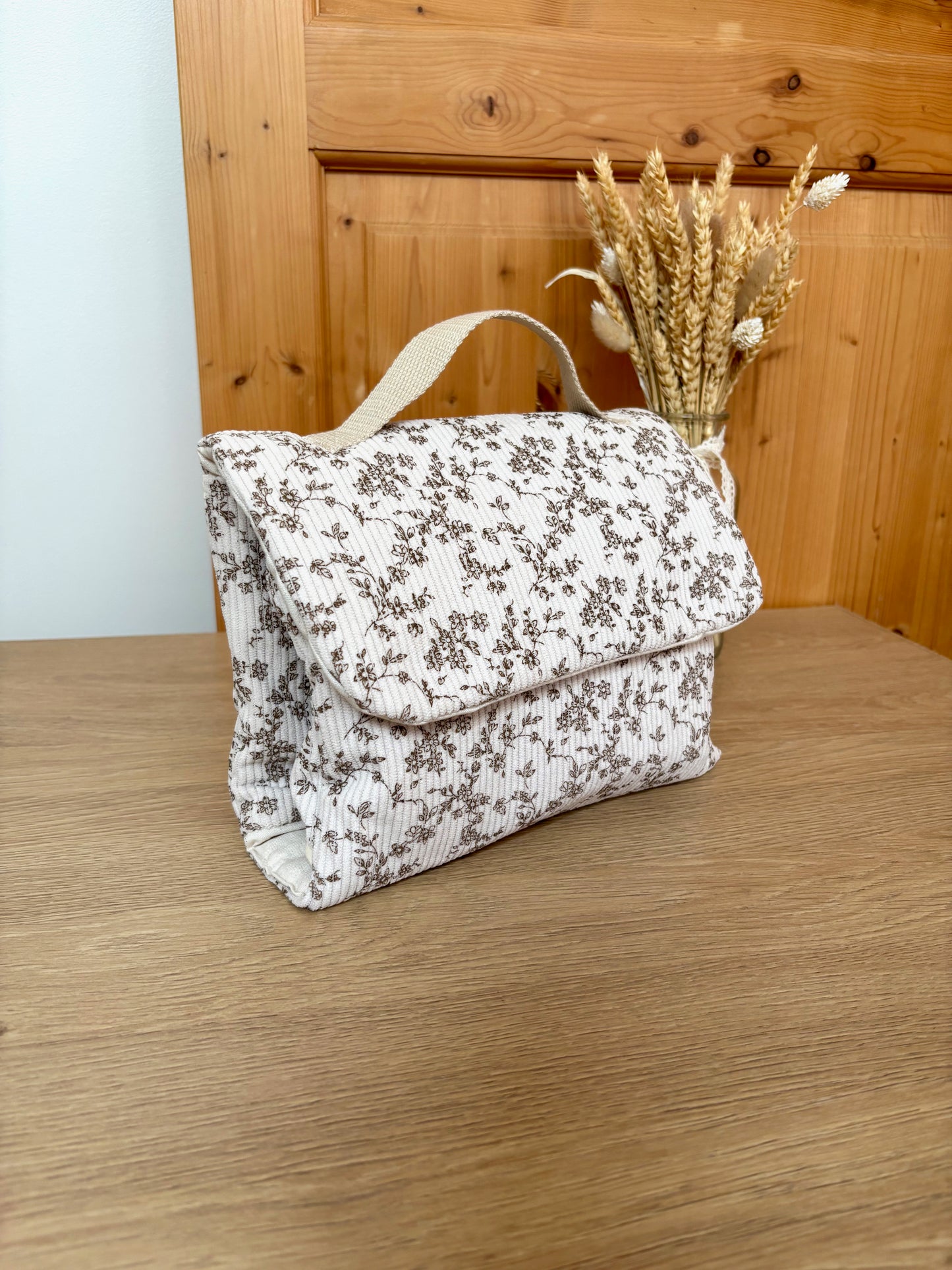 Pochette à langer nomade – Velours fleuri